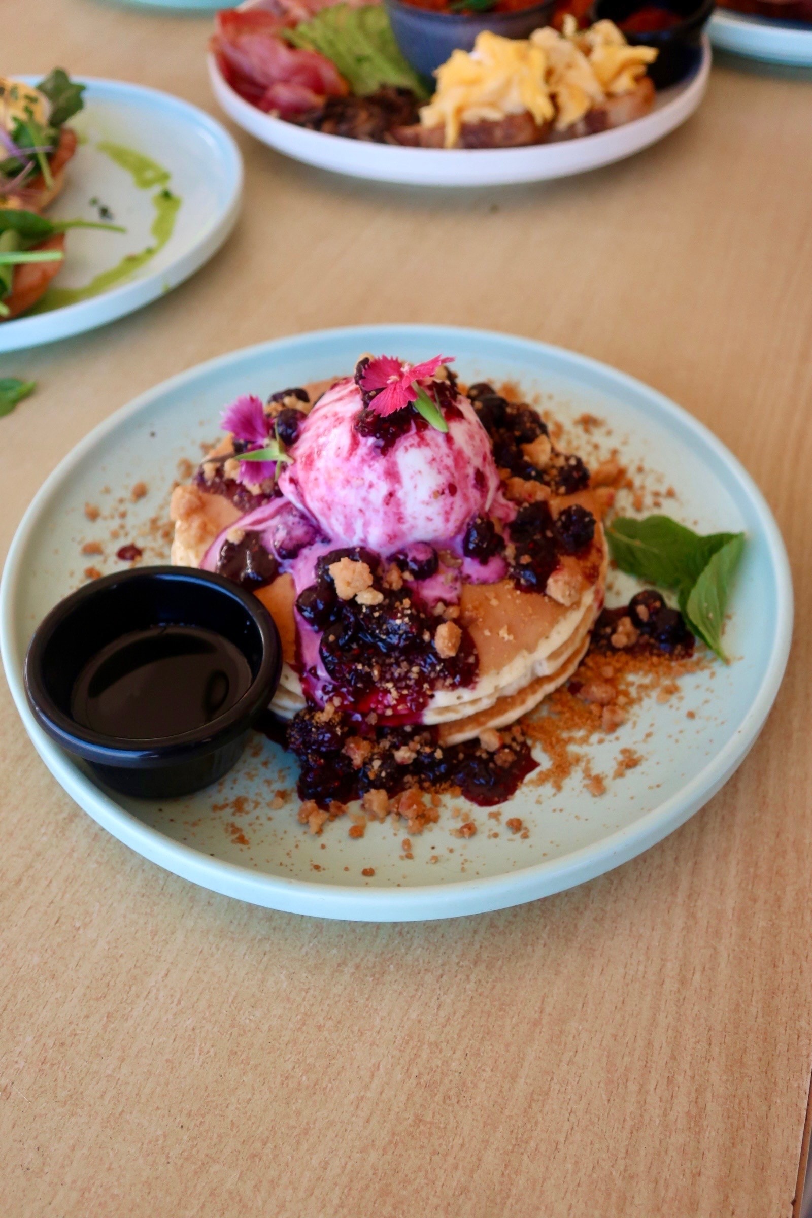 Pancakes with berry compote and ice cream