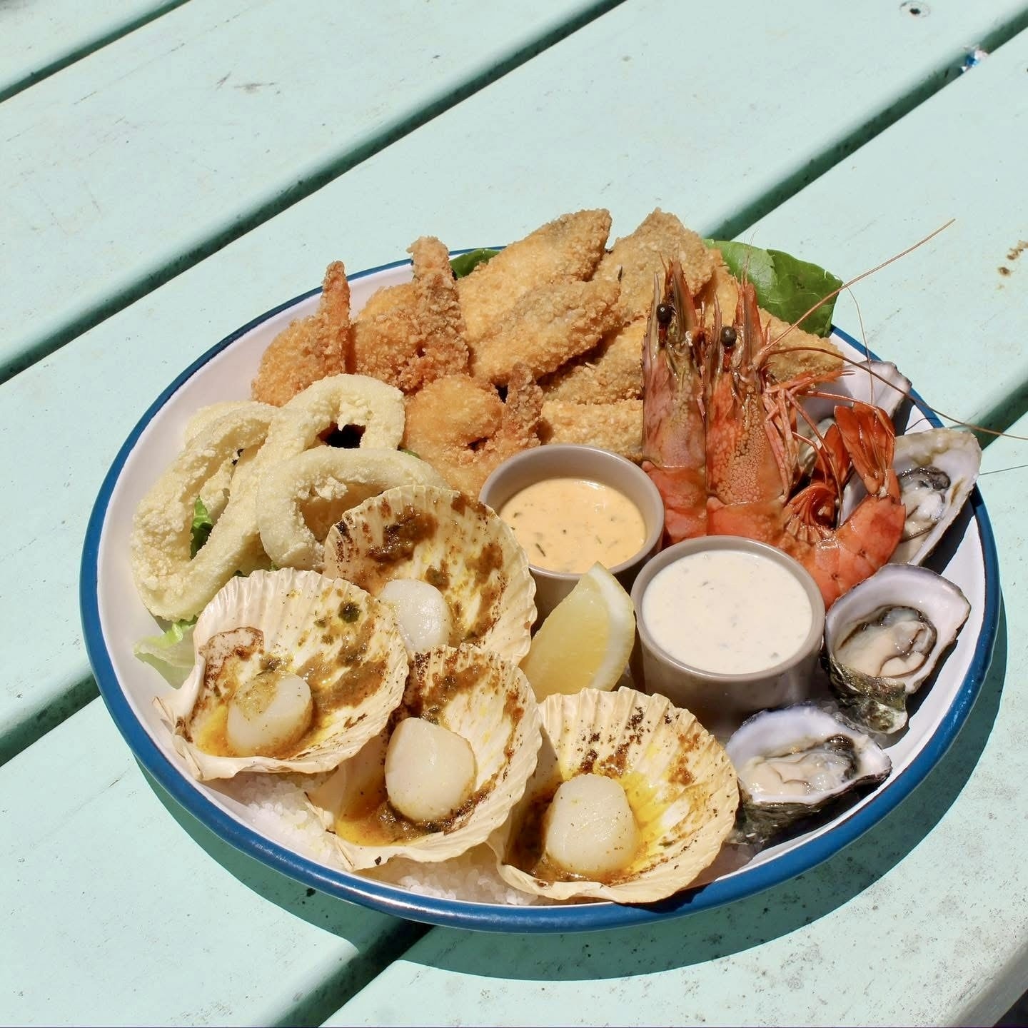 Seafood platter with scallops, prawns, calamari and oysters